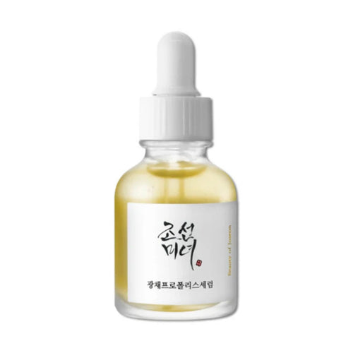 Beauty of Joseon Propolis Glow Serum in clear glass dropper bottle with white ribbed cap and pale yellow liquid